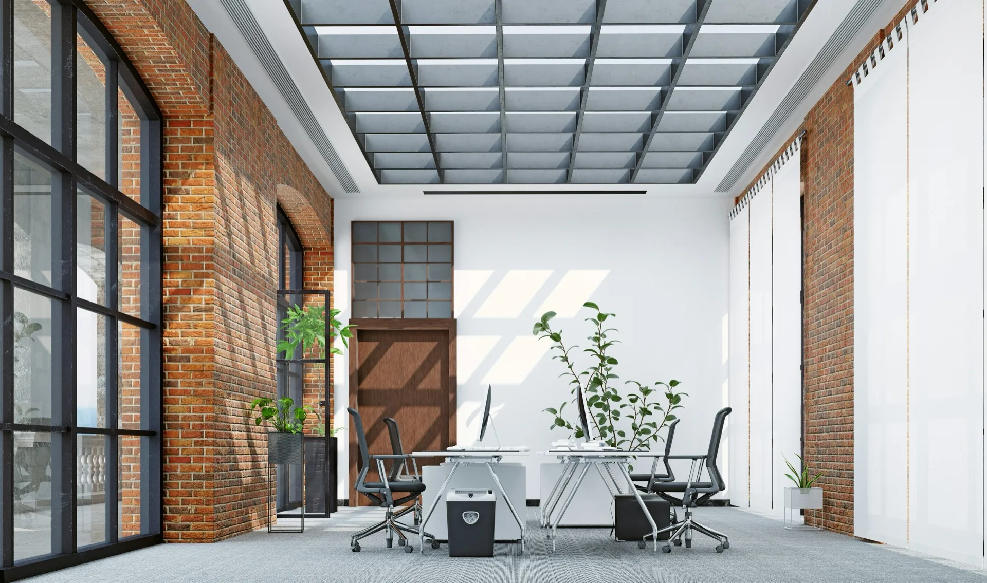 Modern office with exposed brick and skylight