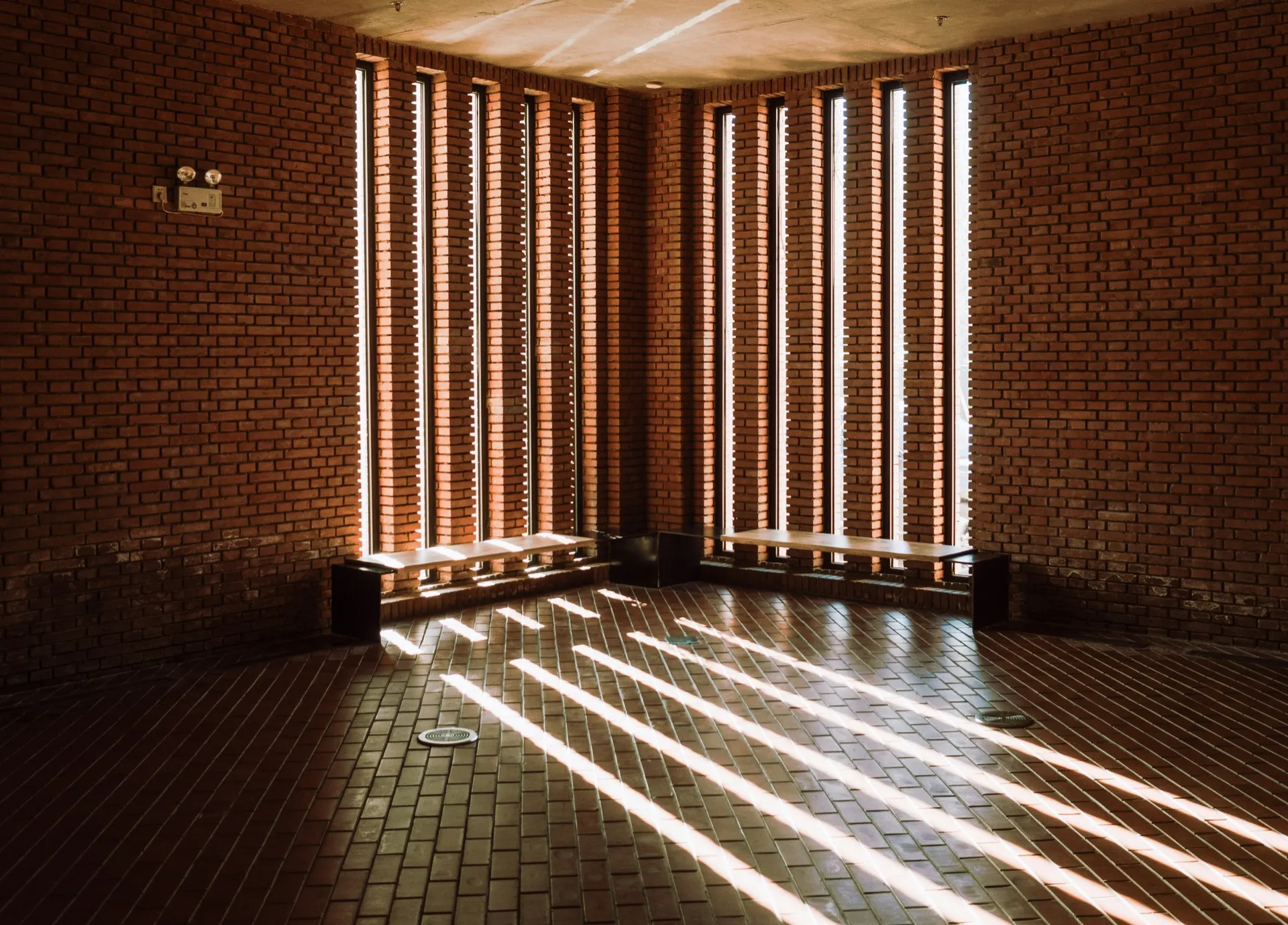 Light streaming through brick louvres